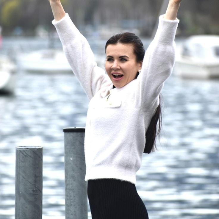 Liam Chen, Client Relations Director, discussing corporate gifting strategy with business clients